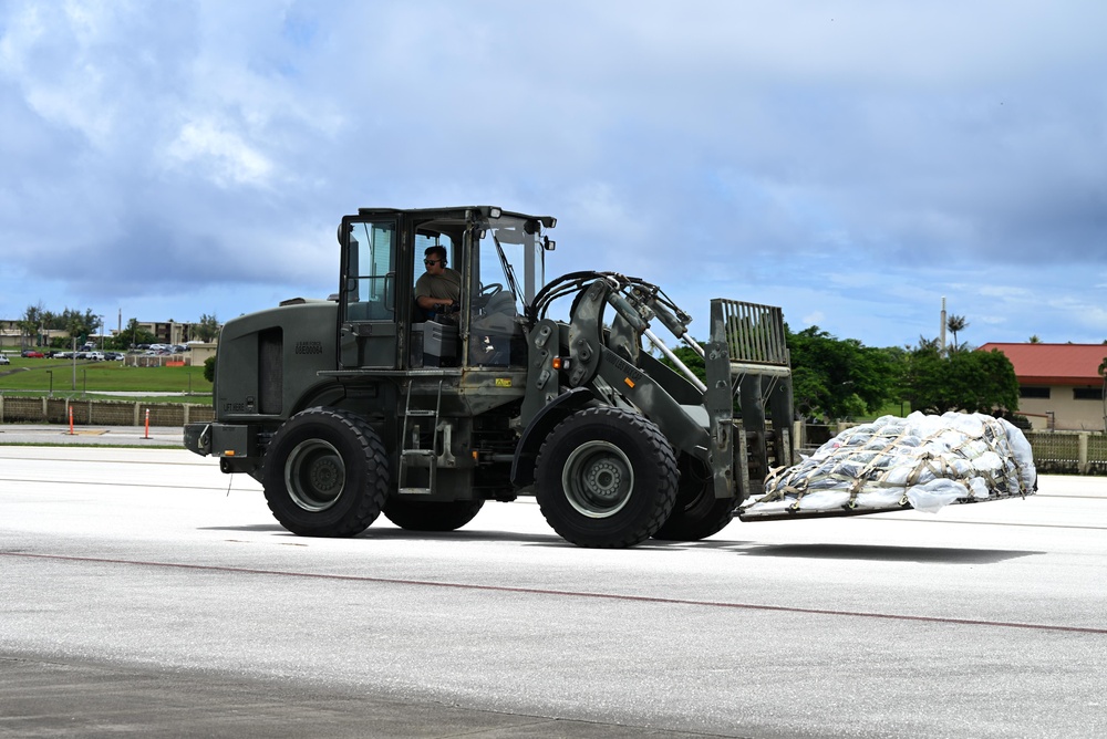 Training in Motion: 734th AMS conducts C-17 engine running offload