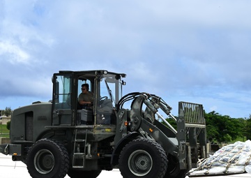 Training in Motion: 734th AMS conducts C-17 engine running offload