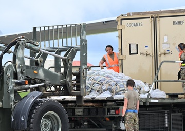 Training in Motion: 734th AMS conducts C-17 engine running offload