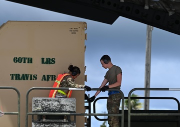 Training in Motion: 734th AMS conducts C-17 engine running offload