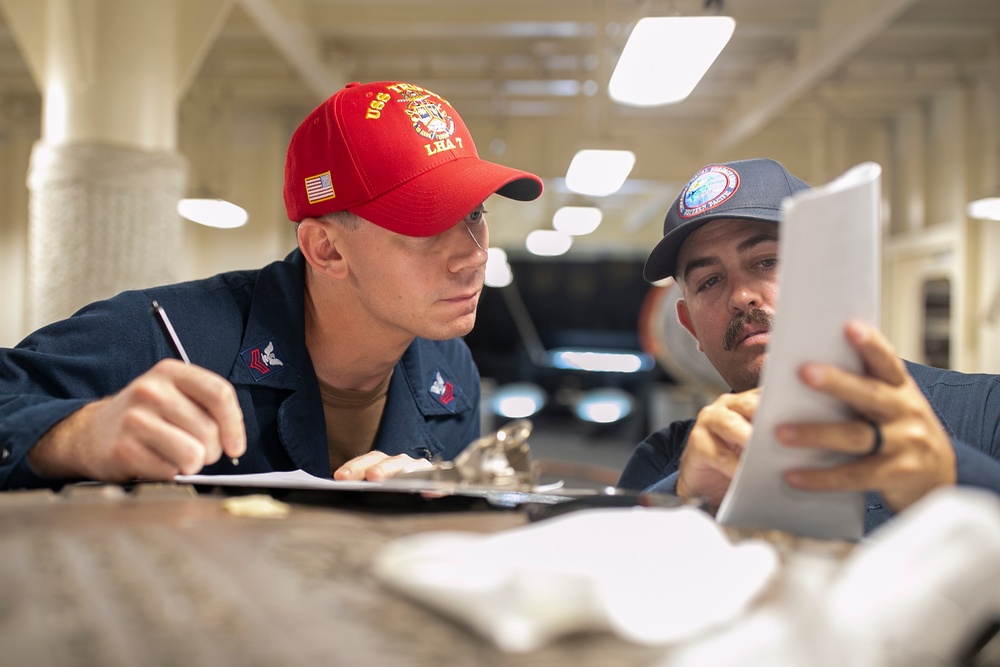 USS Tripoli Conducts A 8010 Drill