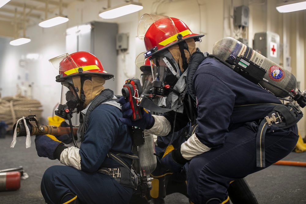 USS Tripoli Conducts A 8010 Drill