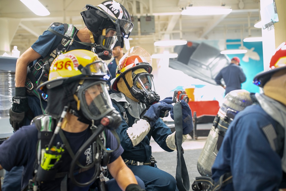 USS Tripoli Conducts A 8010 Drill