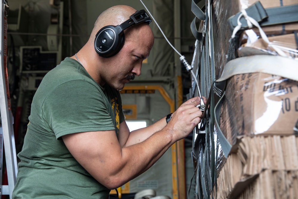 U.S. Marines conduct air drops, low-level flights