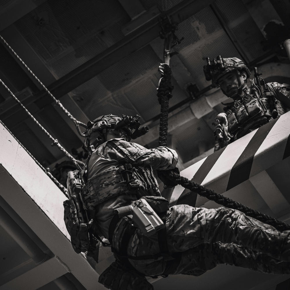 EODMU 5 Sailors Conduct Fast Rope Drills