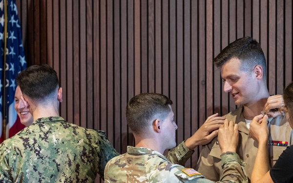 New Navy Band Sailors Pinned during Promotion Ceremony