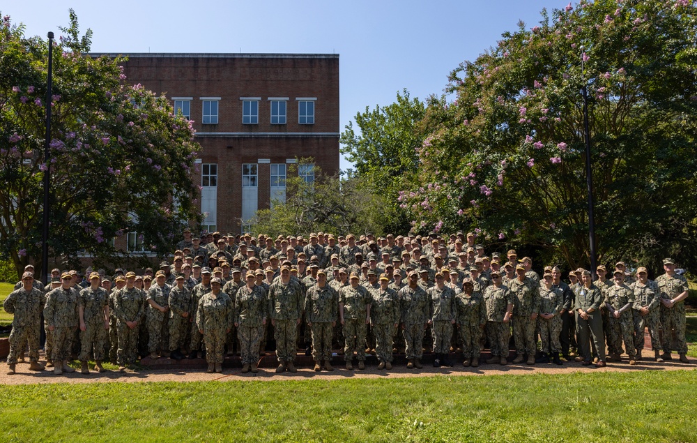 Rear Adm. Blackmon Poses for Group Photo with RSOI Sailors
