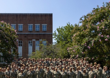 Rear Adm. Blackmon Poses for Group Photo with RSOI Sailors