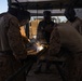 Task Force Forge Marines weld engineer stakes in preparation for barrier reinforcement