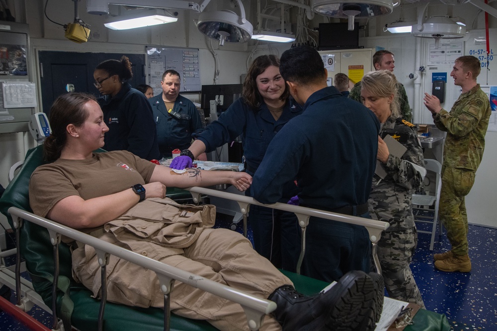 Fleet Surgical Team 7 Conducts Blood Draw Training aboard USS America (LHA 6) during Talisman Sabre 25