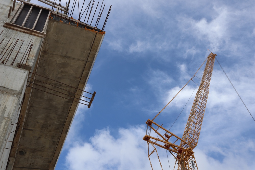 A Crane Towers Overhead During Construction on Camp Blaz