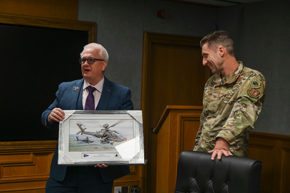 RAF Mildenhall commander Col. Garlow is presented with an award by the British Ministry of Defense