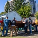 USS Frank Cable (AS 40) Sailors participate in a COMREL at Queensland Maritime Museum