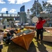 USS Frank Cable (AS 40) Sailors participate in a COMREL at Queensland Maritime Museum