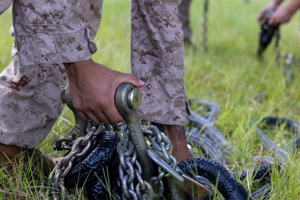 U.S. Marines with Logistics Operations School perform helicopter support team training