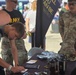 &quot;Staff Sgt. Devon Nagy (left) and 1st Lt. Jeremy Lee (right) assist the York Recruiting Company during their outreach at the York Fair in York Pennsylvania.&quot;