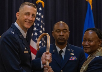 Wilson passes the staff to Hahm