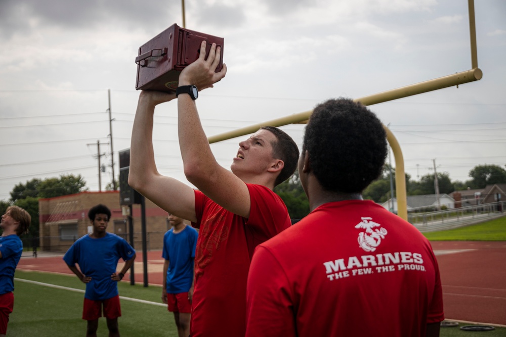 Marines lead workout at Tulsa Memorial High School