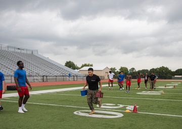 Marines lead workout at Tulsa Memorial High School