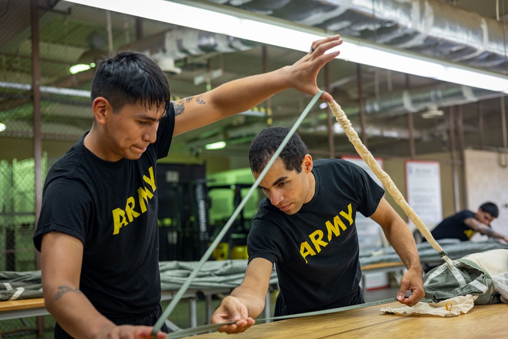 647th Quartermaster Company Riggers Prepare Parachutes