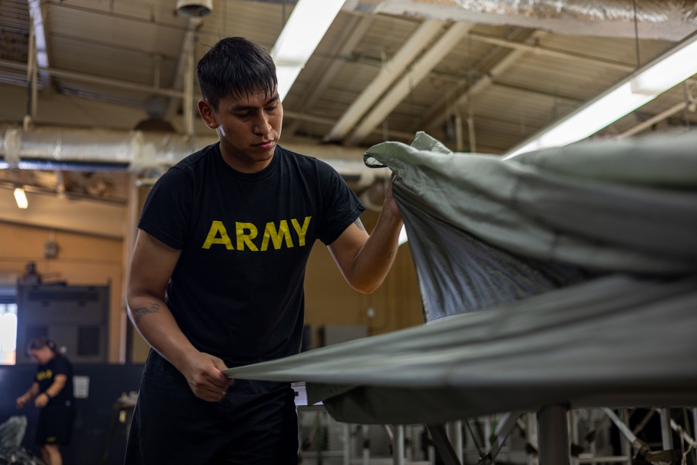 647th Quartermaster Company Riggers Prepare Parachutes