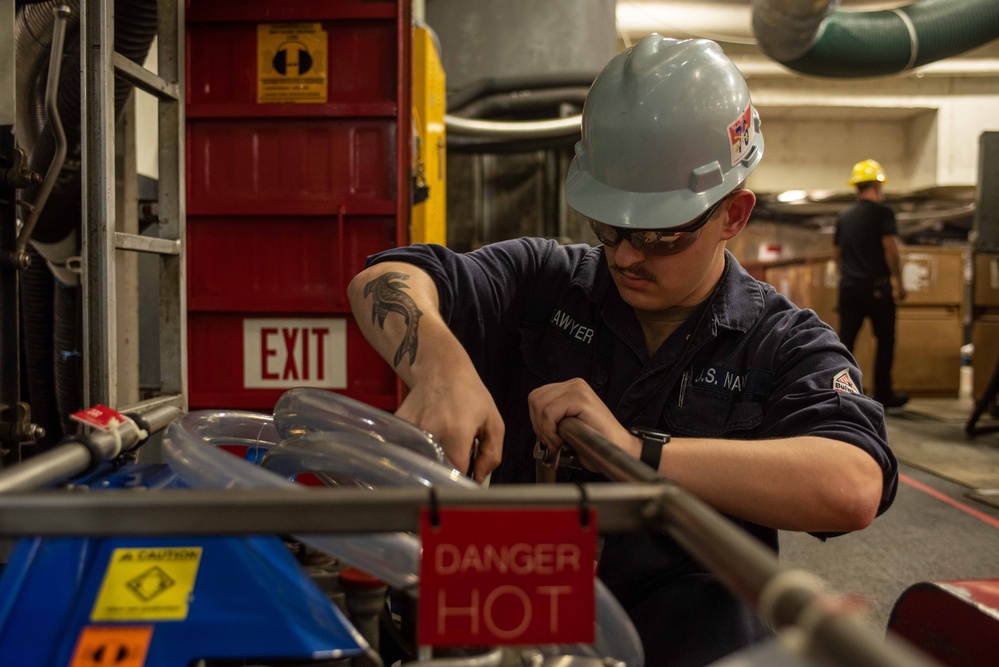 Ronald Reagan Sailors perform maintenance