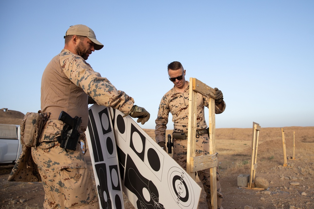 Coalition Members Conduct Weapons Training at Beneslawa Range