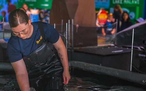 Sailors Join Sturgeon Feeding at Great Lakes Aquarium During Navy Week