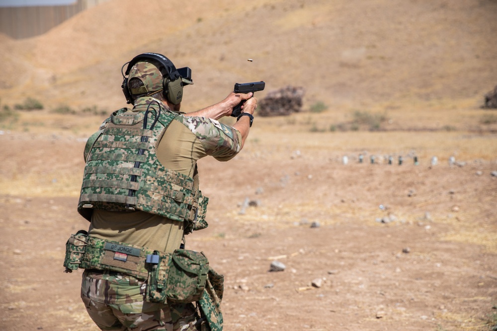 Coalition Members Conduct Weapons Training at Beneslawa Range