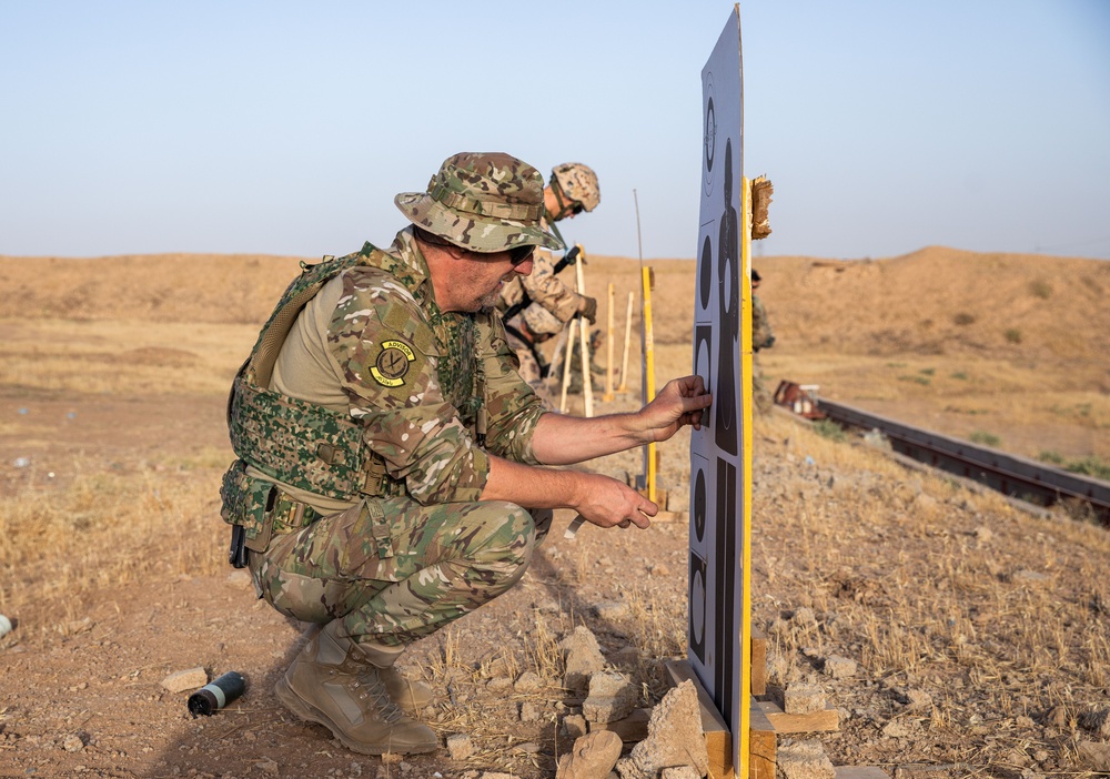 Coalition Members Conduct Weapons Training at Beneslawa Range
