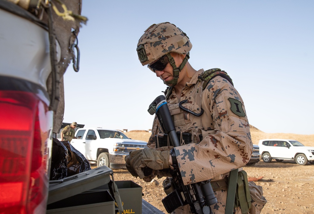 Coalition Members Conduct Weapons Training at Beneslawa Range