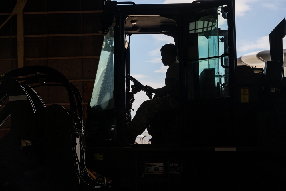 Training Together: U.S. Airmen Share Cargo Inspection Practices with JASDF
