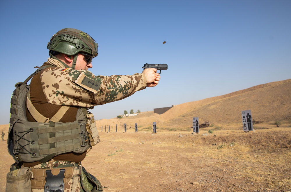Coalition Members Conduct Weapons Training at Beneslawa Range
