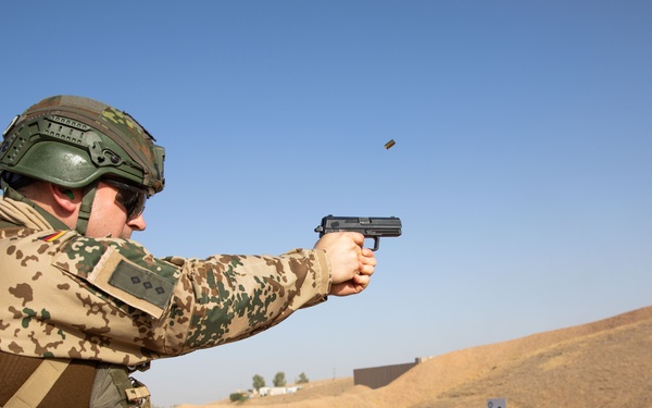 Coalition Members Conduct Weapons Training at Beneslawa Range