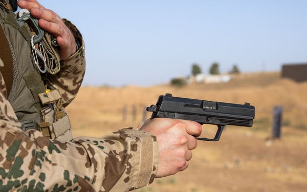 Coalition Members Conduct Weapons Training at Beneslawa Range