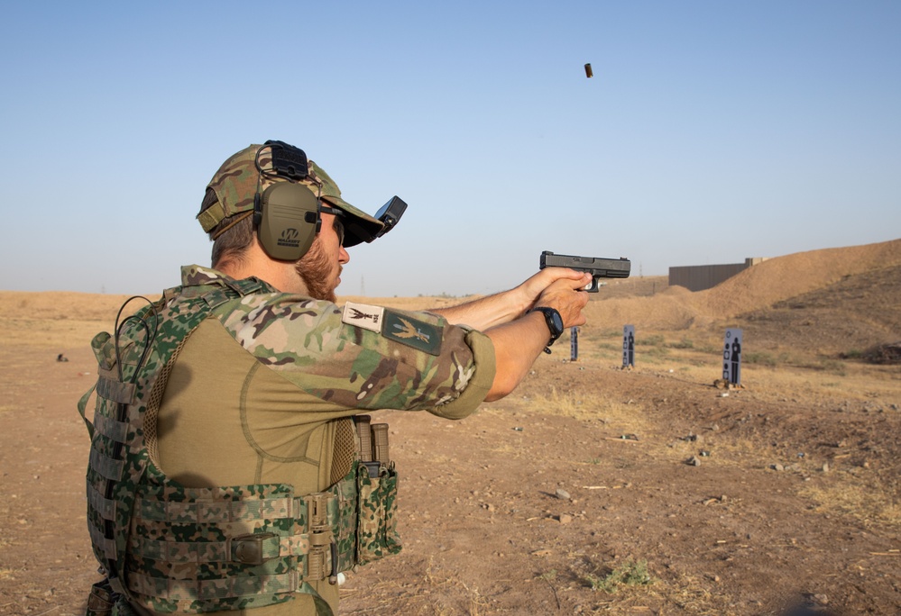 Coalition Members Conduct Weapons Training at Beneslawa Range