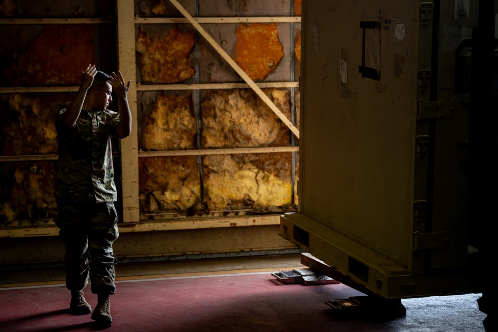 Training Together: U.S. Airmen Share Cargo Inspection Practices with JASDF
