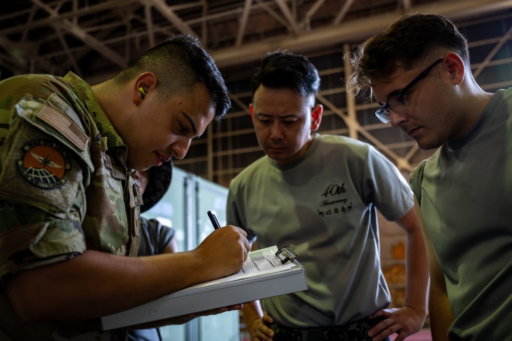 Training Together: U.S. Airmen Share Cargo Inspection Practices with JASDF