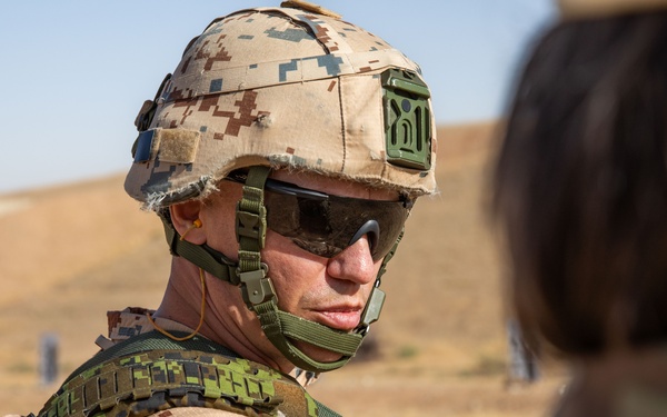 Coalition Members Conduct Weapons Training at Beneslawa Range