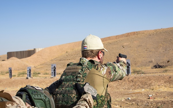 Coalition Members Conduct Weapons Training at Beneslawa Range