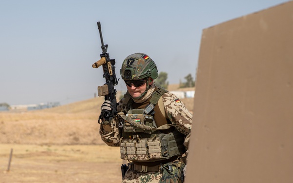 Coalition Members Conduct Weapons Training at Beneslawa Range