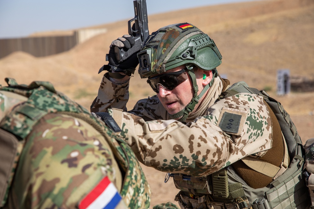Coalition Members Conduct Weapons Training at Beneslawa Range