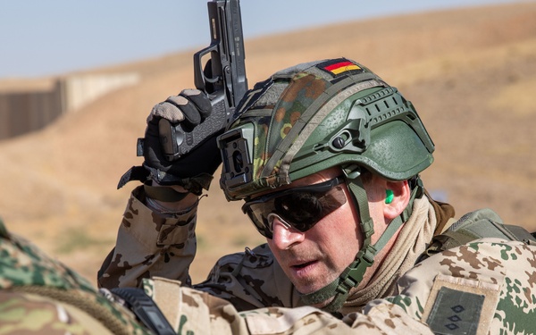 Coalition Members Conduct Weapons Training at Beneslawa Range