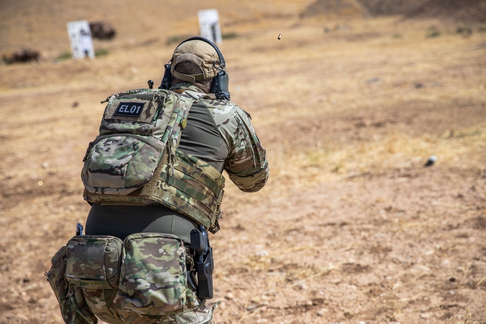 Coalition Members Conduct Weapons Training at Beneslawa Range