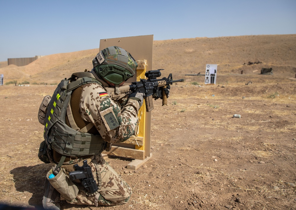 Coalition Members Conduct Weapons Training at Beneslawa Range