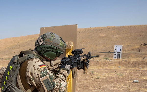 Coalition Members Conduct Weapons Training at Beneslawa Range