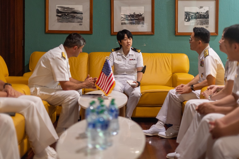 U.S. Navy Sailors and Republic of Korea Sailors conduct a meeting during Pacific Partnership 2025 in Lae, Papua New Guinea, July 2025