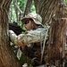Alpha team leader from Brutal Company fires from a fighting position during a situation training exercise at Camp Casey, South Korea, July 29, 2025
