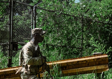 A rifleman from B Co., 4-9IN continues movement across a mountain ridge line during situational training at Camp Casey, South Korea, July 29, 2025
