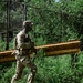 A rifleman from B Co., 4-9IN continues movement across a mountain ridge line during situational training at Camp Casey, South Korea, July 29, 2025